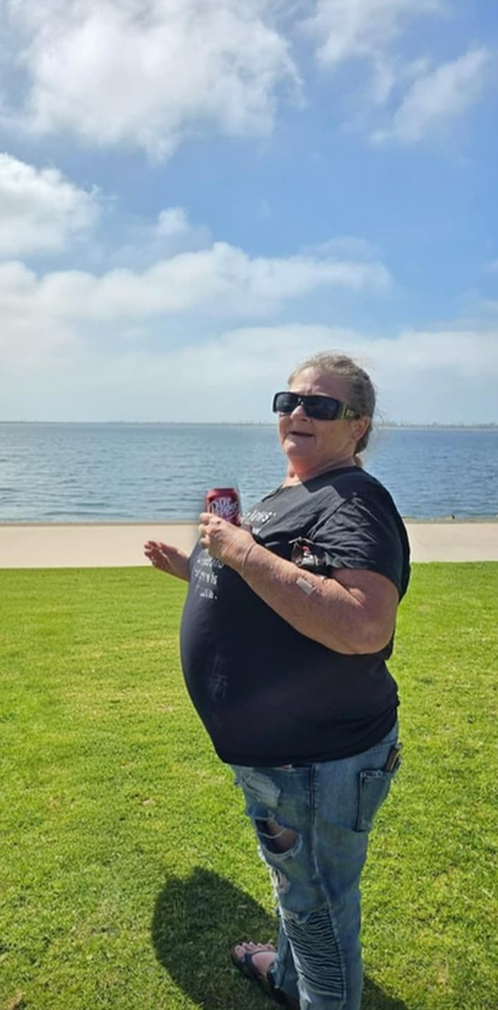 Local Woman Lisa Hodges Caught Negotiating with Pigeons